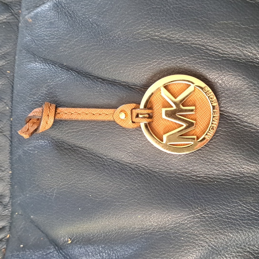 MK Gold bag charm